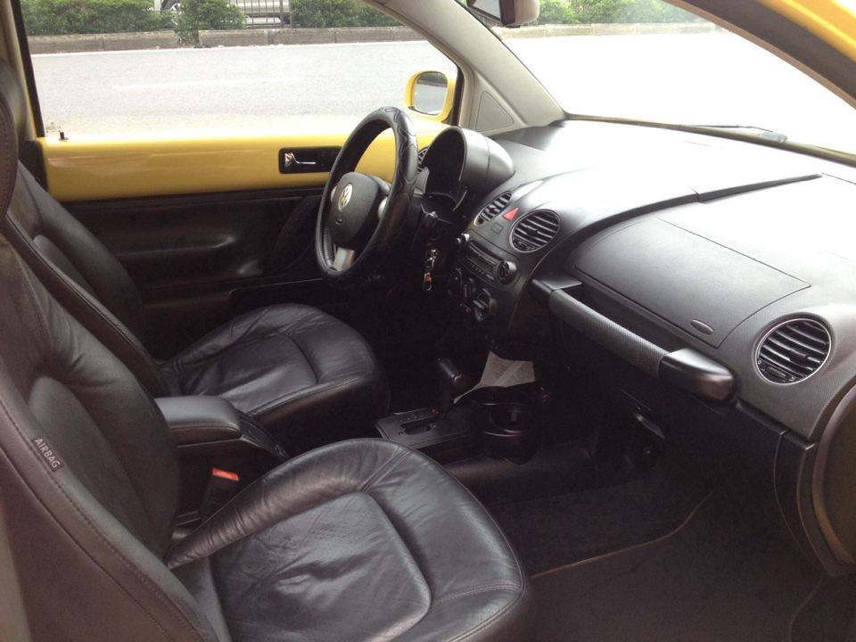 Volkswagen New Beetle 2.0AT 2009 - Cần bán xe Volkswagen New Beetle 2.0 đời 2009, màu vàng, nhập khẩu nguyên chiếc