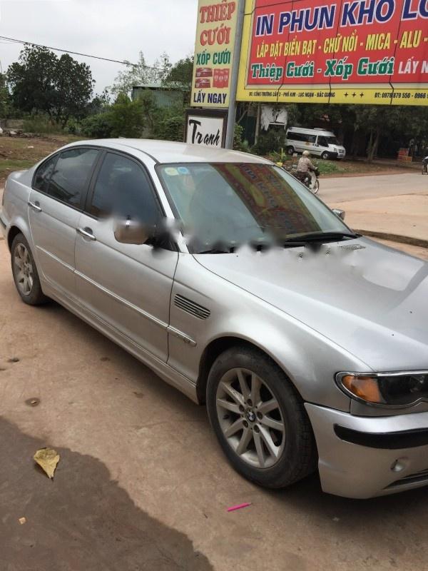 BMW 3 Series 318i 2002 - Bán xe BMW 318i sản xuất 2002, màu bạc, nhập khẩu nguyên chiếc số sàn