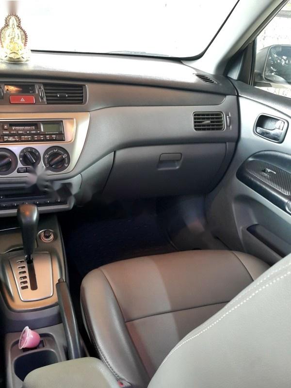 Mitsubishi Lancer GLX 1.6AT 2005 - Bán xe cũ Mitsubishi Lancer GLX 1.6AT đời 2005, màu vàng số tự động, 290 triệu