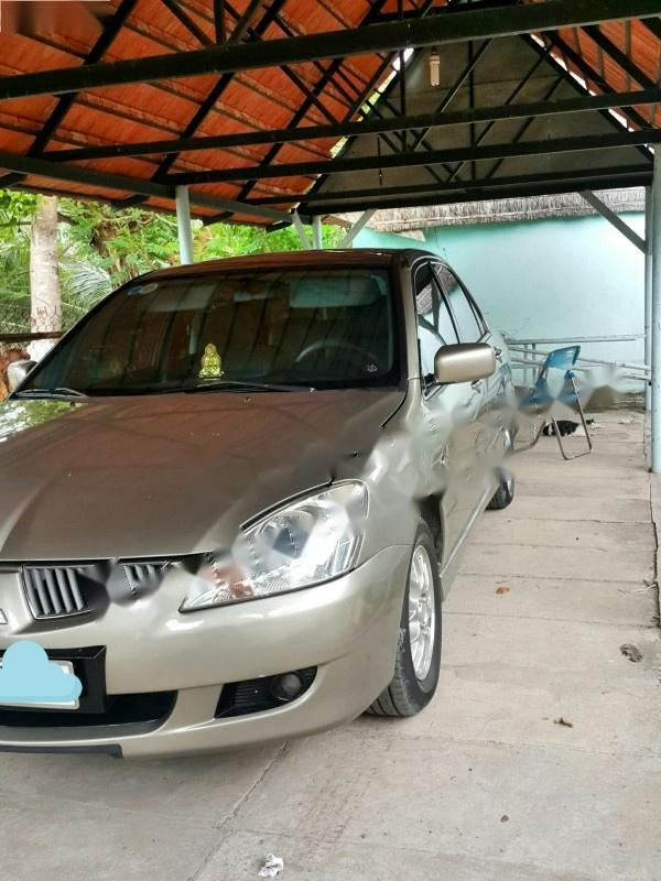 Mitsubishi Lancer GLX 1.6AT 2005 - Bán xe cũ Mitsubishi Lancer GLX 1.6AT đời 2005, màu vàng số tự động, 290 triệu