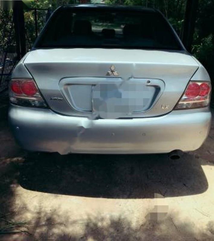 Mitsubishi Lancer 2003 - Bán xe cũ Mitsubishi Lancer đời 2003, màu bạc số tự động