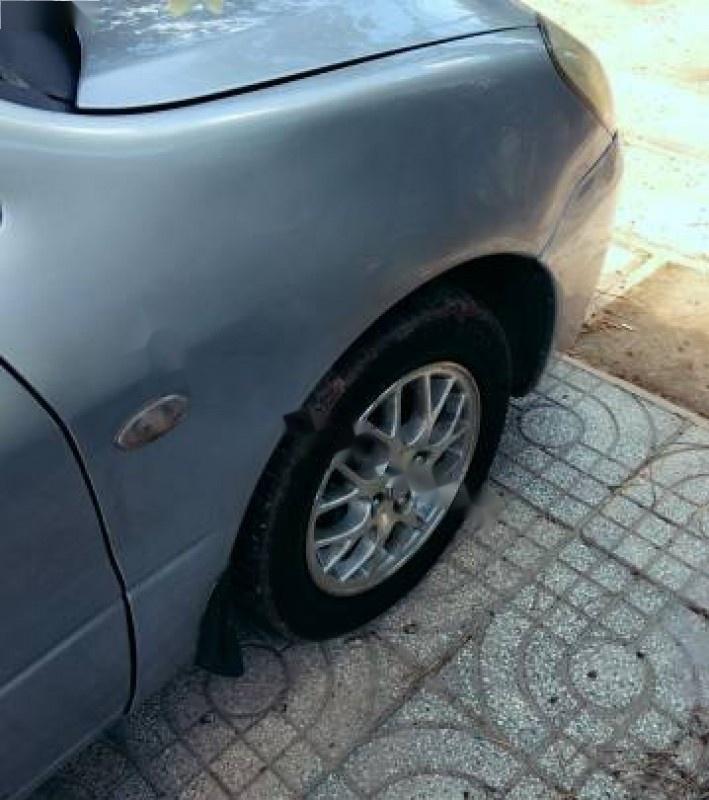 Mitsubishi Lancer AT 2003 - Bán xe Mitsubishi Lancer AT đời 2003, màu bạc số tự động