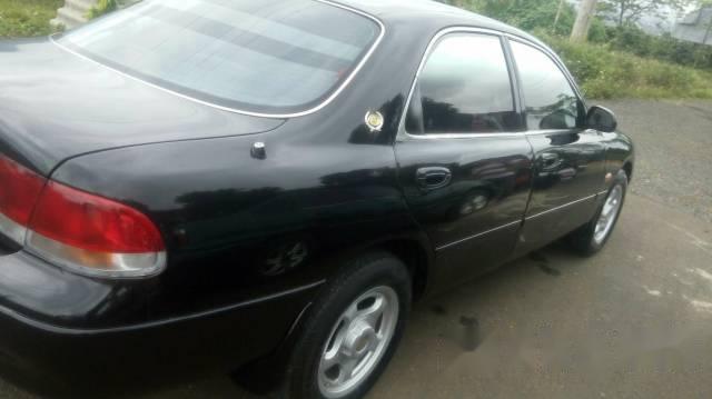 Mazda 626    1995 - Bán xe cũ Mazda 626 đời 1995, màu đen giá cạnh tranh