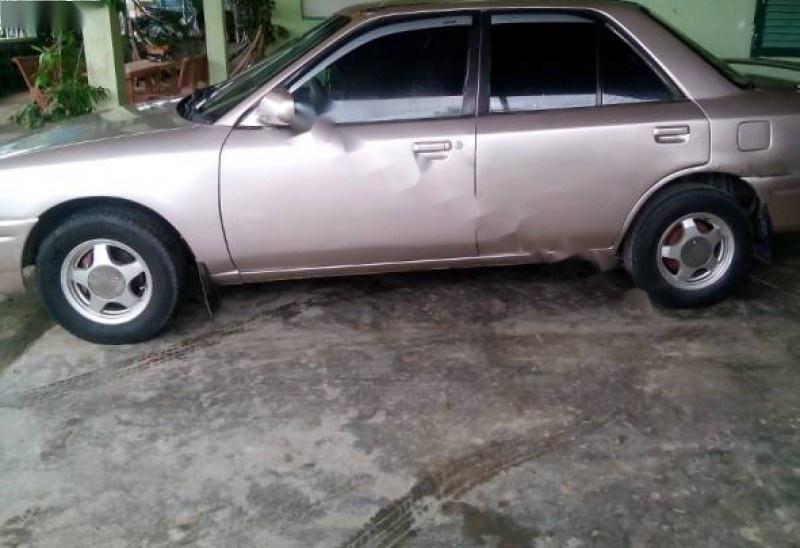 Mazda 323 1995 - Bán Mazda 323 đời 1995, màu hồng, nhập khẩu  