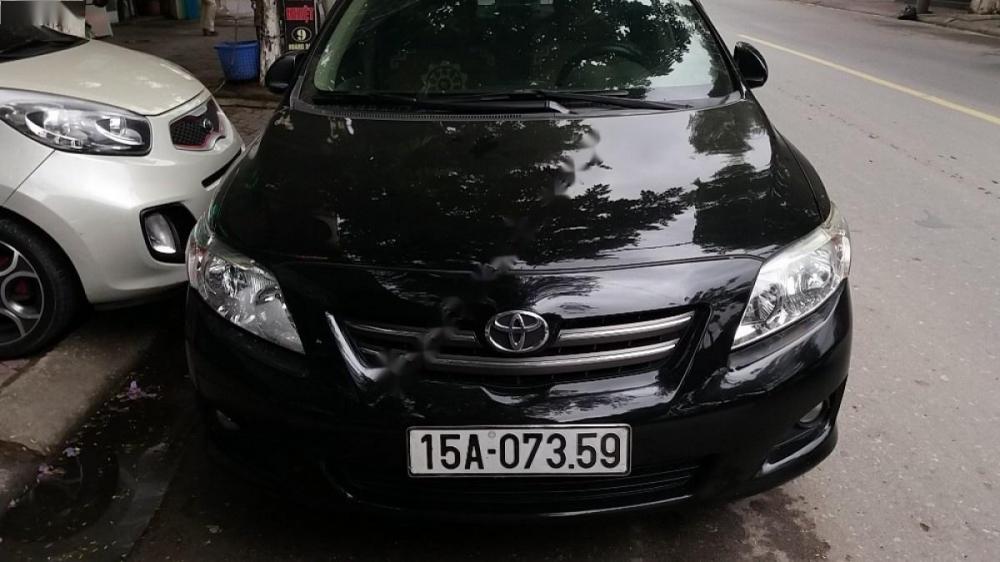 Toyota Corolla altis MT 2011 - Bán Toyota Corolla Altis MT sản xuất 2011, màu đen số sàn giá cạnh tranh