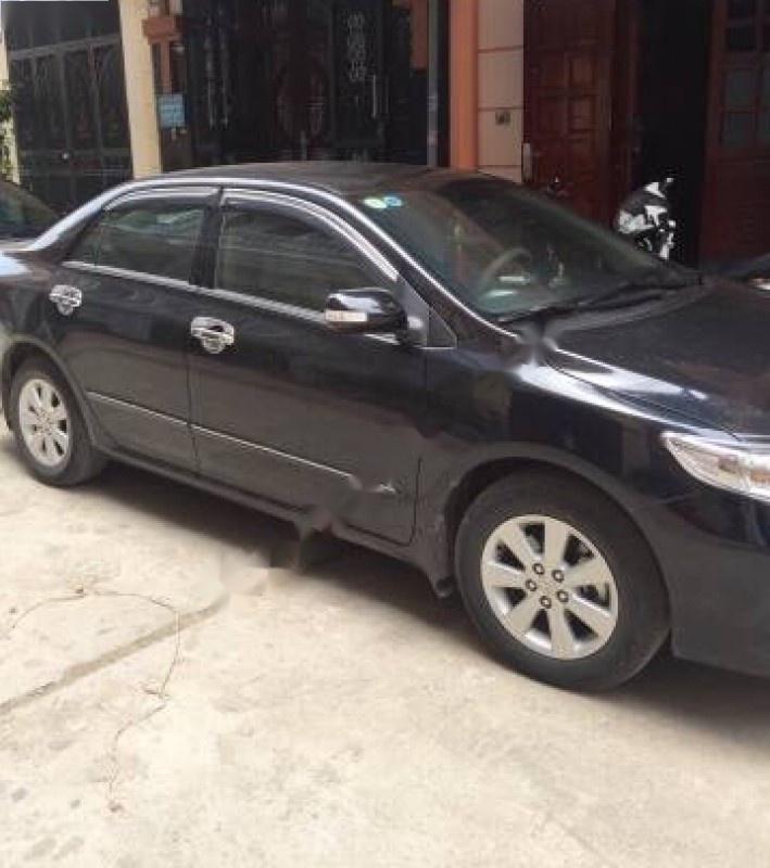Toyota Corolla altis 1.8AT 2014 - Bán ô tô Toyota Corolla altis 1.8AT đời 2014, màu đen số tự động