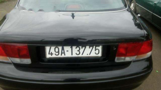 Mazda 626    1995 - Bán xe cũ Mazda 626 đời 1995, màu đen giá cạnh tranh