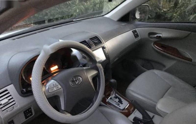 Toyota Corolla altis 1.8G AT 2009 - Bán Toyota Corolla altis 1.8G AT đời 2009, màu bạc, 570tr