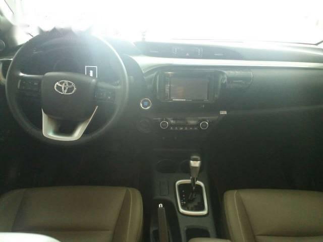 Toyota Hilux   G 3.0 2016 - Bán Toyota Hilux G 3.0 đời 2016, màu xám xe gia đình