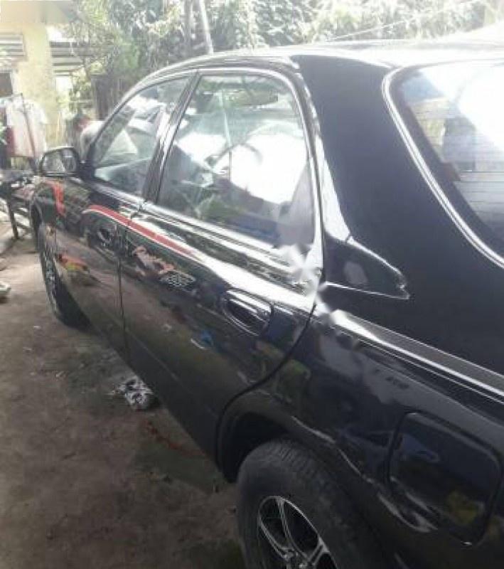 Mazda 626 2.0 MT 1994 - Bán Mazda 626 2.0 MT đời 1994, màu đen, nhập khẩu
