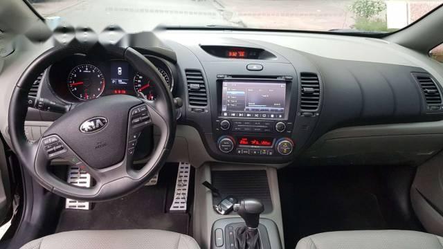 Kia K3 AT 2016 - Bán Kia K3 AT đời 2016, màu đen, giá 585tr