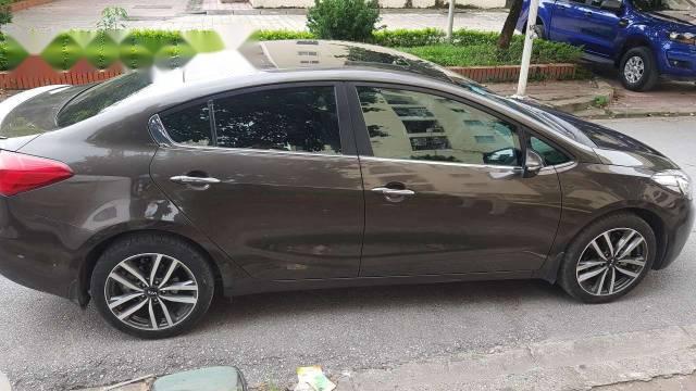 Kia K3 AT 2016 - Bán Kia K3 AT đời 2016, màu đen, giá 585tr