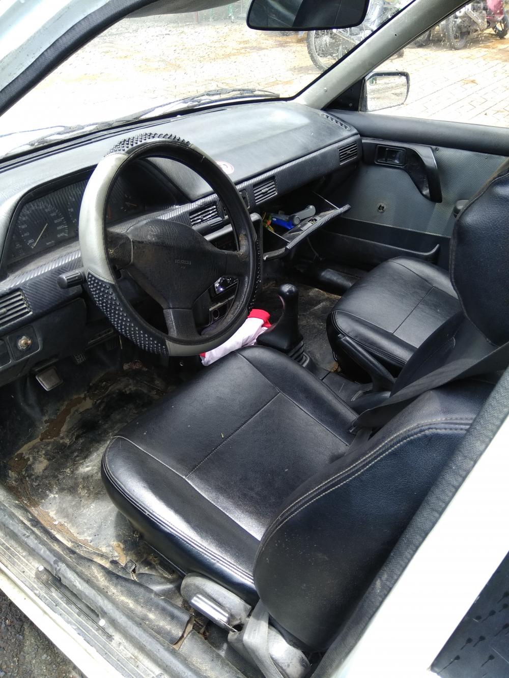 Mazda 323 1992 - Bán Mazda 323 sản xuất 1992, màu trắng, nhập khẩu