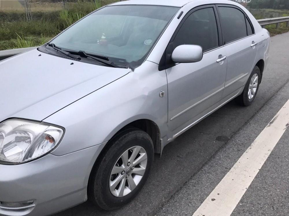 Toyota Corolla XLi 1.8 MT 2004 - Bán xe Toyota Corolla XLi 1.8 MT đời 2004, màu bạc, nhập khẩu nguyên chiếc