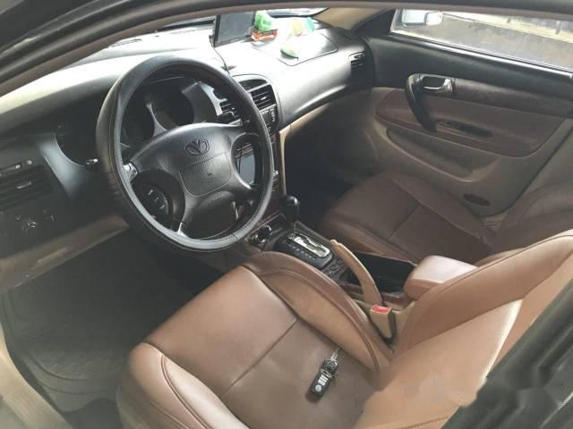 Daewoo Magnus 2004 - Cần bán lại xe Daewoo Magnus đời 2004, màu đen chính chủ, giá tốt
