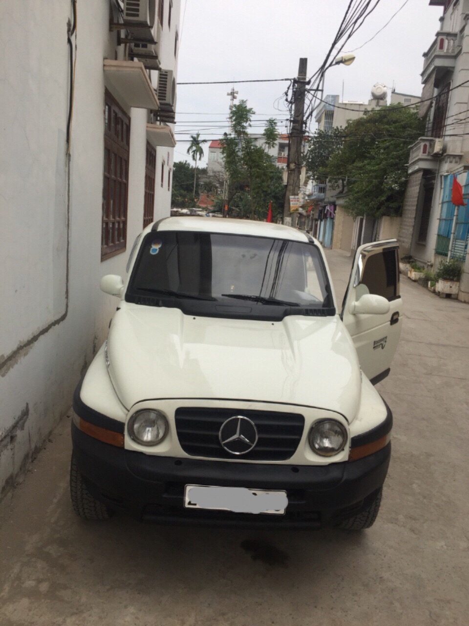 Ssangyong Korando TX5 2005 - Bán xe Ssangyong Korando TX5 ĐKLĐ năm 2010, màu trắng, xe nhập