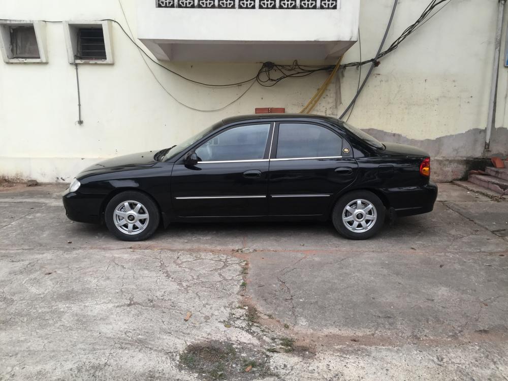 Kia Spectra 2003 - Cần bán xe Kia Spectra đời 2003, màu đen