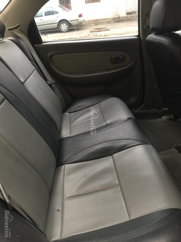 Kia Spectra 2003 - Cần bán xe Kia Spectra đời 2003, màu đen