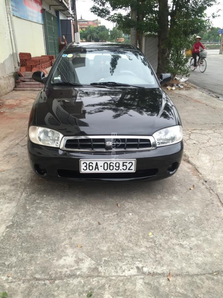 Kia Spectra 2003 - Cần bán xe Kia Spectra đời 2003, màu đen