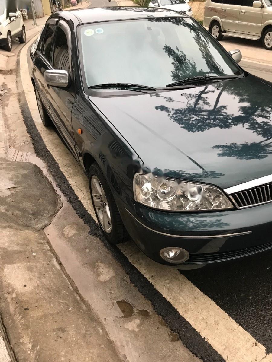 Ford Laser GHIA 2003 - Bán xe Ford Laser GHIA sản xuất 2003, màu xanh lam xe gia đình