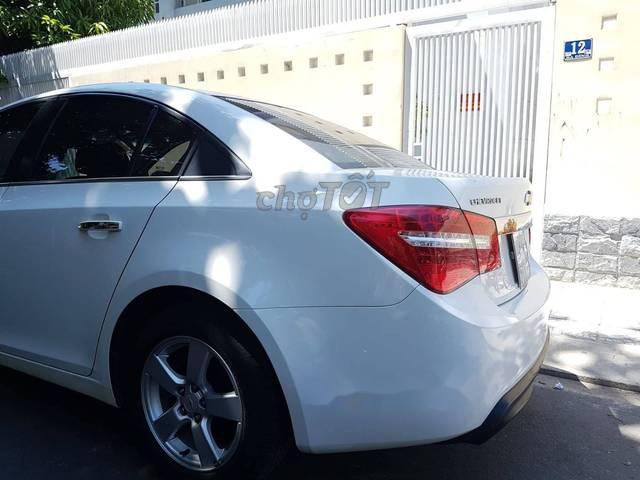 Chevrolet Cruze   MT 2012 - Bán Chevrolet Cruze MT sản xuất năm 2012, màu trắng, cam kết không kinh doanh, không đâm đụng ngập nước
