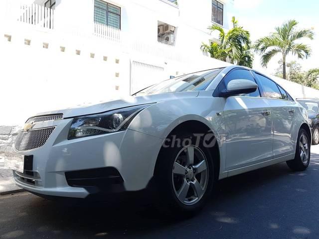 Chevrolet Cruze   MT 2012 - Bán Chevrolet Cruze MT sản xuất năm 2012, màu trắng, cam kết không kinh doanh, không đâm đụng ngập nước