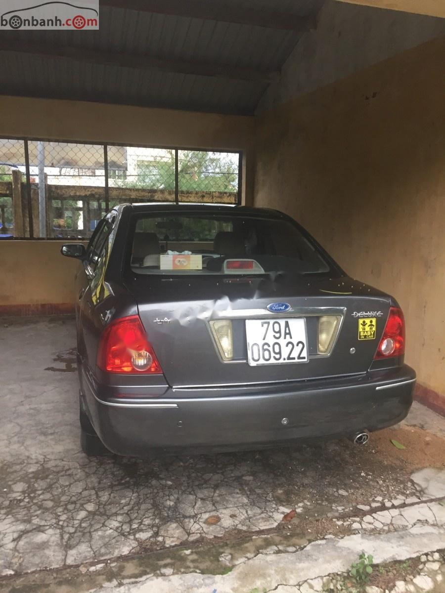 Ford Laser Delu 1.6 MT 2002 - Bán Ford Laser Delu 1.6 MT sản xuất năm 2002, màu xám 