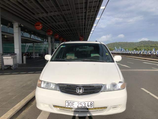 Honda Odyssey 2004 - Cần bán xe Honda Odyssey 2004, màu trắng xe gia đình giá cạnh tranh