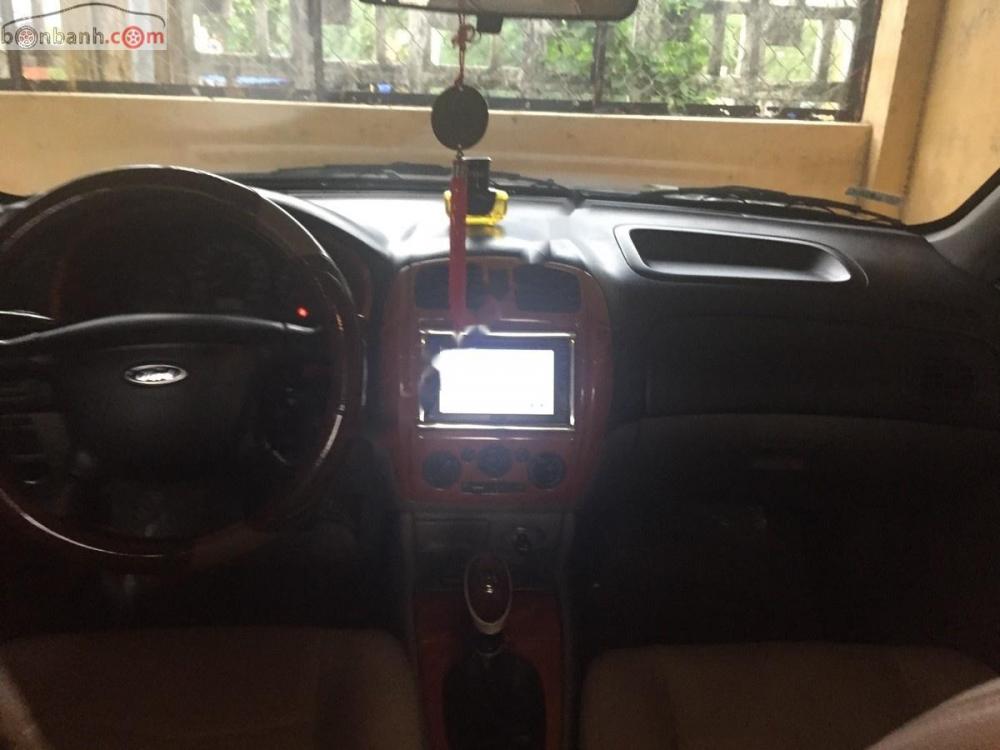 Ford Laser Delu 1.6 MT 2002 - Bán Ford Laser Delu 1.6 MT sản xuất năm 2002, màu xám 