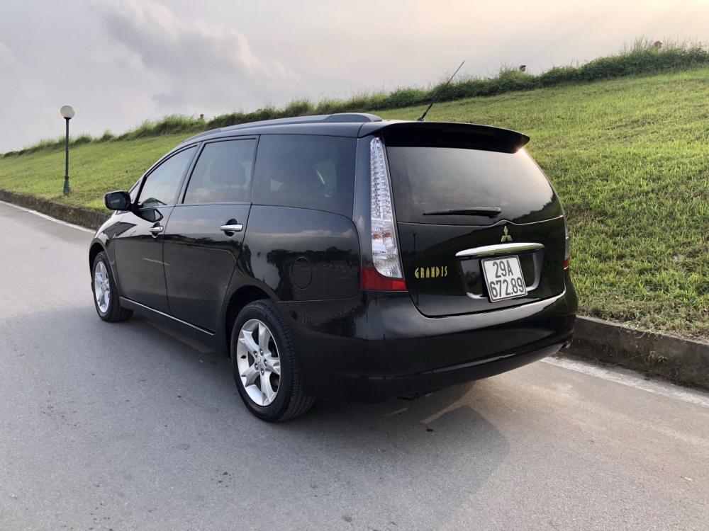 Mitsubishi Grandis Limited 2.4MIVEC 2010 - Mitsubishi Grandis Limited 2.4MIVEC đời 2010, màu đen, đi ít giá tốt