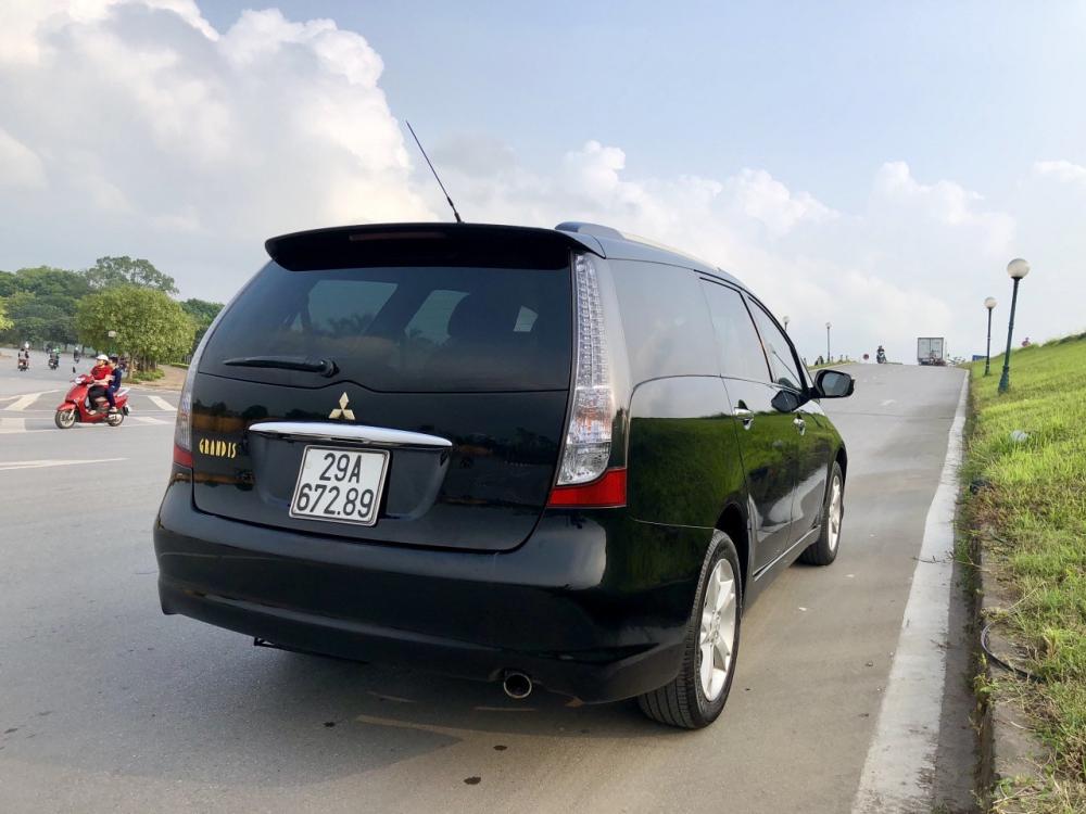 Mitsubishi Grandis Limited 2.4MIVEC 2010 - Mitsubishi Grandis Limited 2.4MIVEC đời 2010, màu đen, đi ít giá tốt