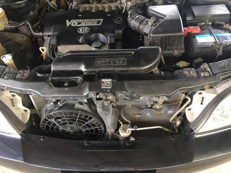 Kia Carnival   2009 - Bán ô tô Kia Carnival đời 2009, màu đen còn mới