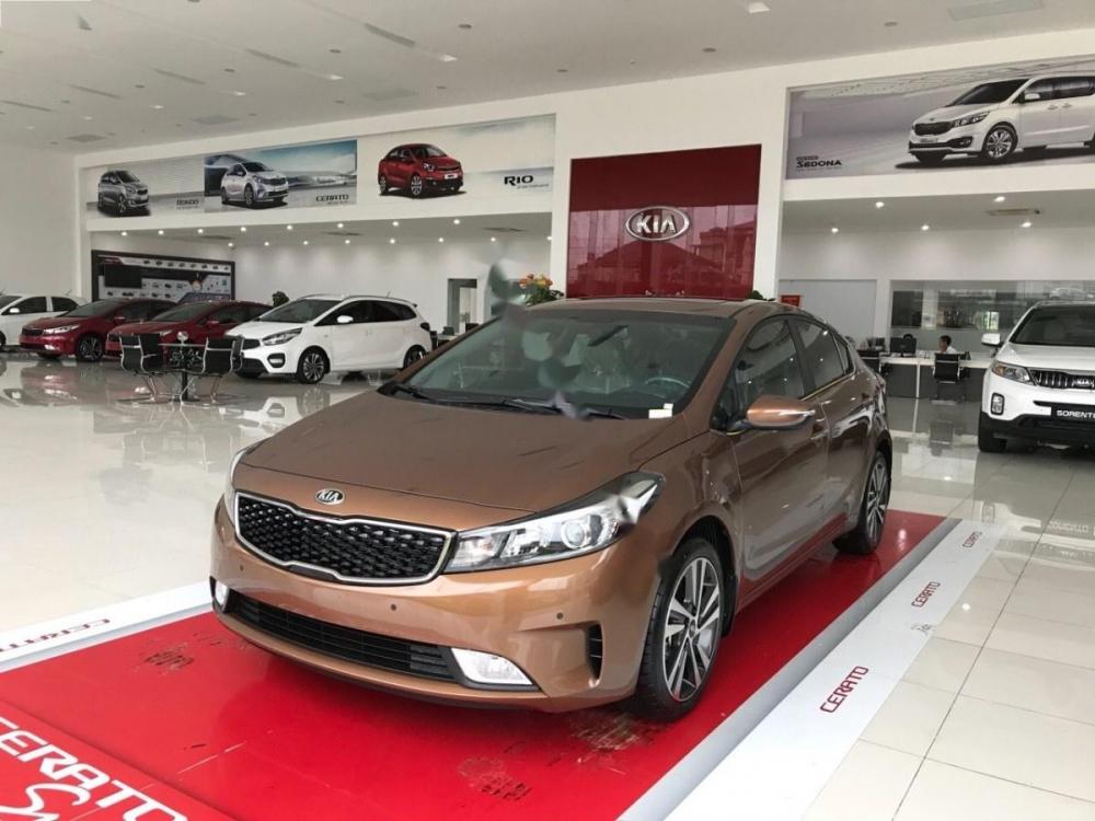 Kia Cerato 1.6 AT 2018 - Cần bán xe Kia Cerato 1.6 AT sản xuất 2018, màu nâu, giá chỉ 589 triệu