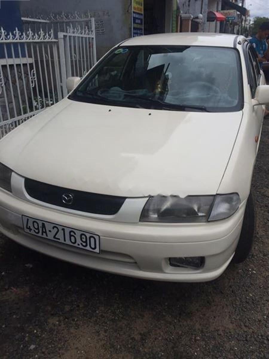 Mazda 323 2000 - Bán xe Mazda 323 2000, màu trắng, chính chủ