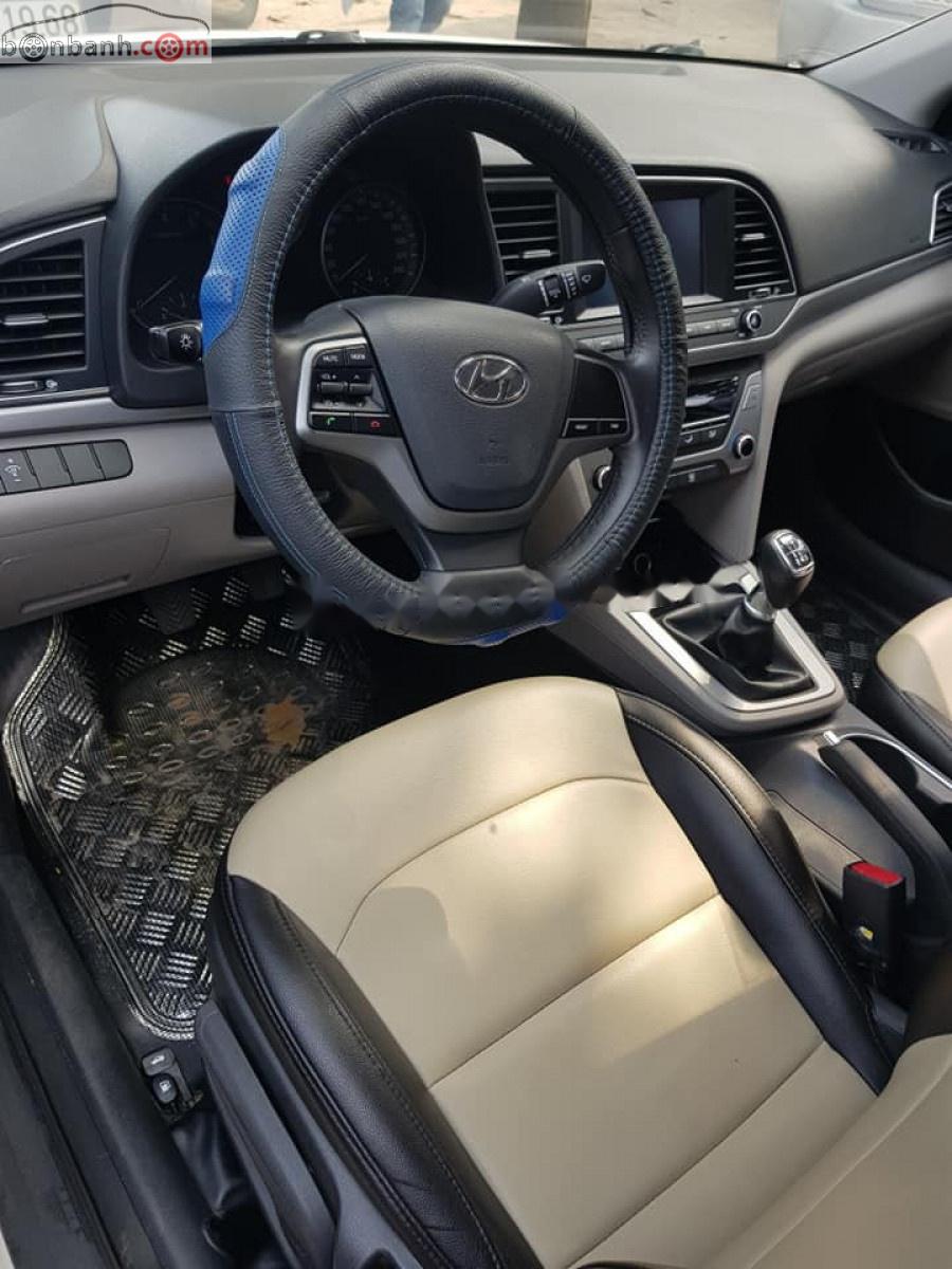 Hyundai Elantra 1.6 MT 2016 - Bán Hyundai Elantra 1.6 MT đời 2016, màu trắng, số sàn