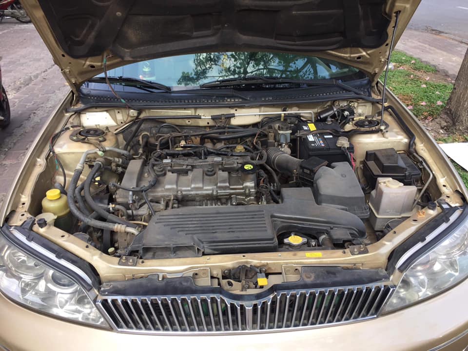Ford Laser 2003 - Cần bán xe Ford Laser sản xuất 2003, màu kem (be), 220 triệu