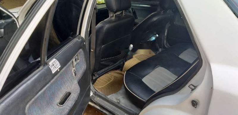 Mazda 323 1995 - Bán ô tô Mazda 323 năm 1995, màu trắng, nhập khẩu