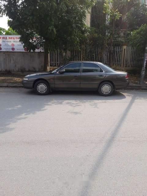 Mazda 626 1996 - Cần bán gấp Mazda 626 đời 1996, màu xám, 90tr