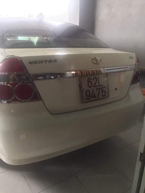 Daewoo Gentra   2009 - Bán lại xe Daewoo Gentra sản xuất 2009, màu trắng xe gia đình giá cạnh tranh