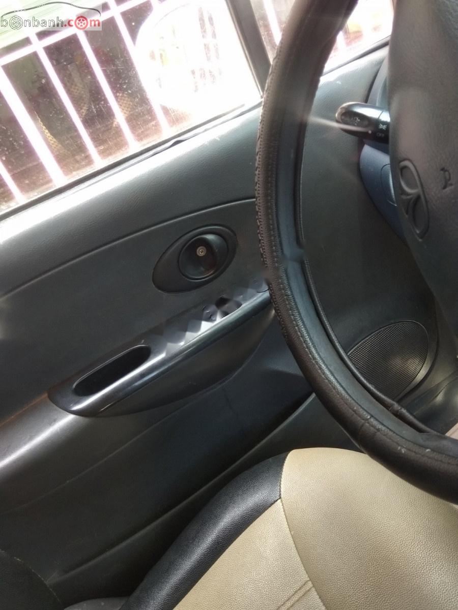 Daewoo Matiz SE 0.8 MT 2003 - Bán Daewoo Matiz SE 0.8 MT sản xuất năm 2003, màu trắng, giá 65tr