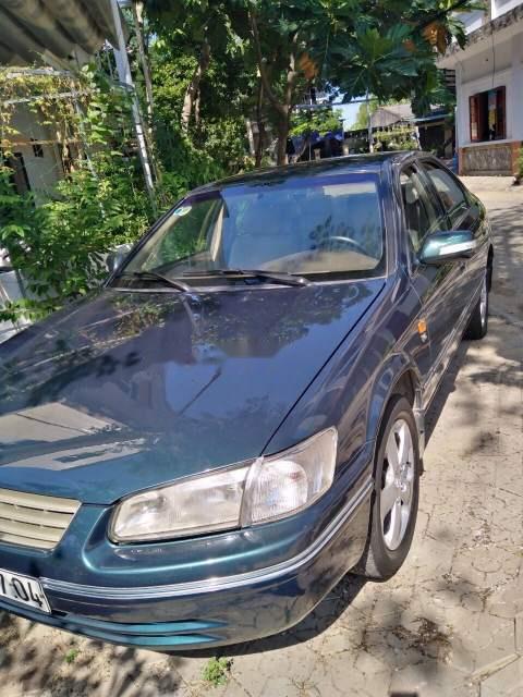 Toyota Camry  MT GLI  1999 - Bán Camry GLI đời 1999, nội thất đẹp, máy móc êm ru
