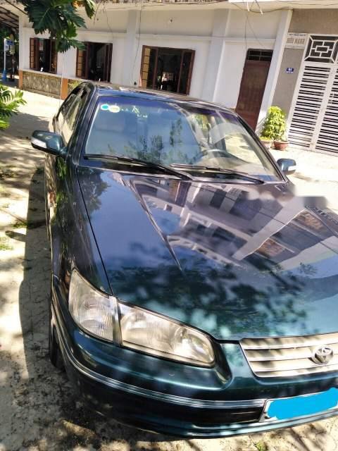 Toyota Camry  MT GLI  1999 - Bán Camry GLI đời 1999, nội thất đẹp, máy móc êm ru