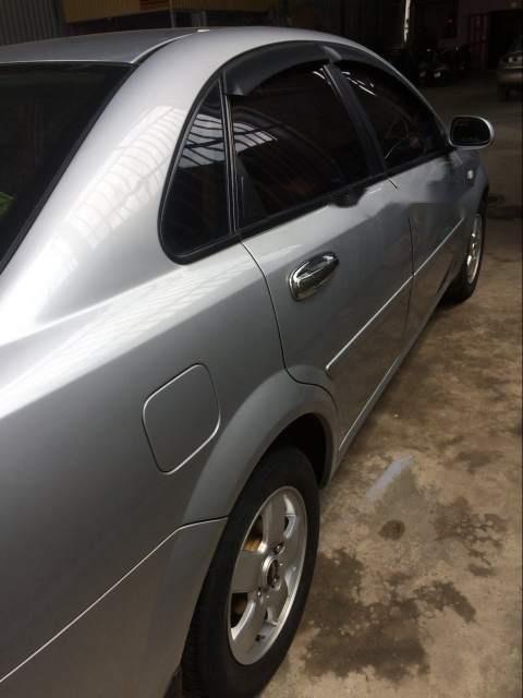 Daewoo Lacetti 2012 - Gia đình bán Daewoo Lacetti 2012, màu bạc, giá chỉ 248 triệu