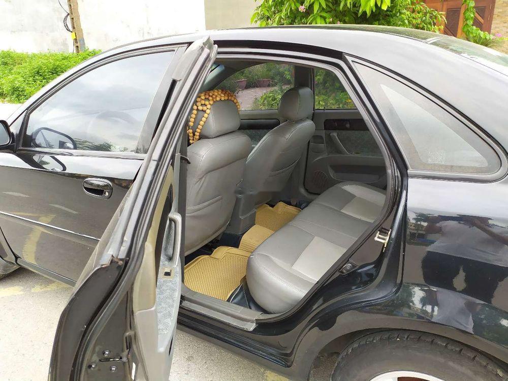 Daewoo Lacetti EX 2005 - Nhà bán Daewoo Lacetti EX đời 2005, màu đen số sàn