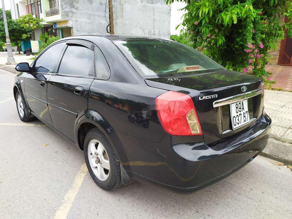 Daewoo Lacetti EX 2005 - Nhà bán Daewoo Lacetti EX đời 2005, màu đen số sàn