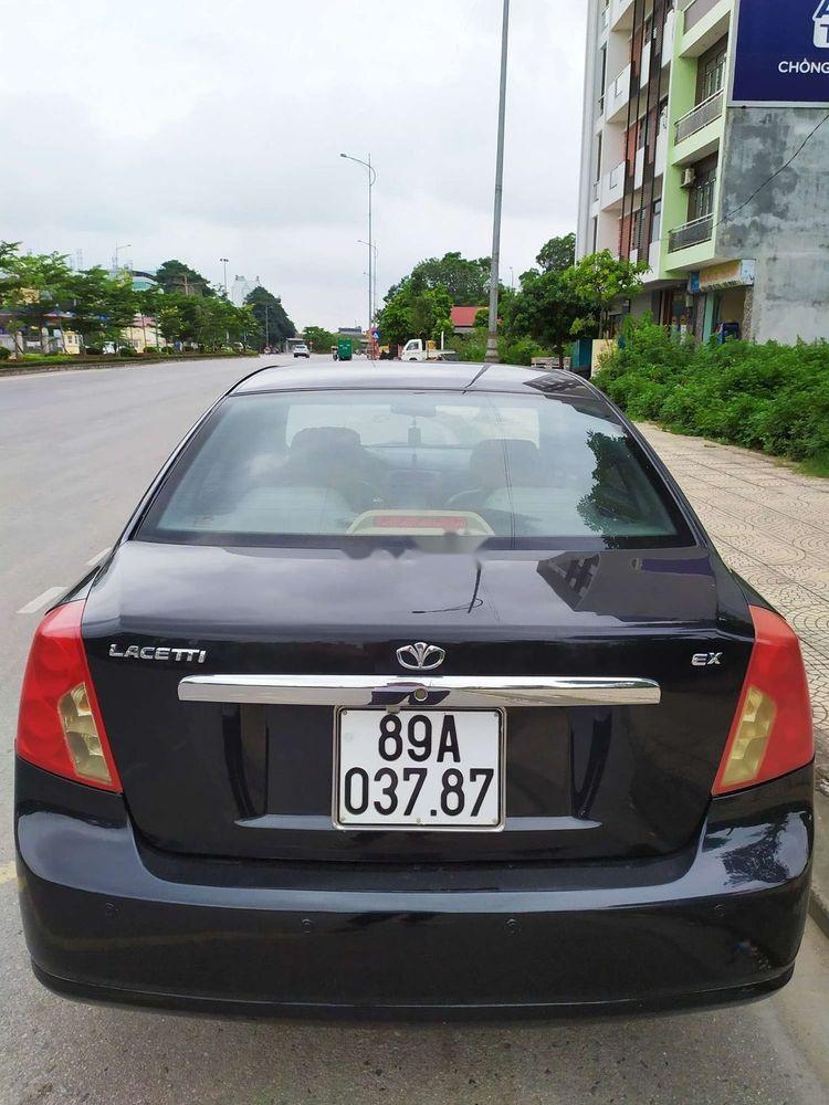Daewoo Lacetti EX 2005 - Nhà bán Daewoo Lacetti EX đời 2005, màu đen số sàn