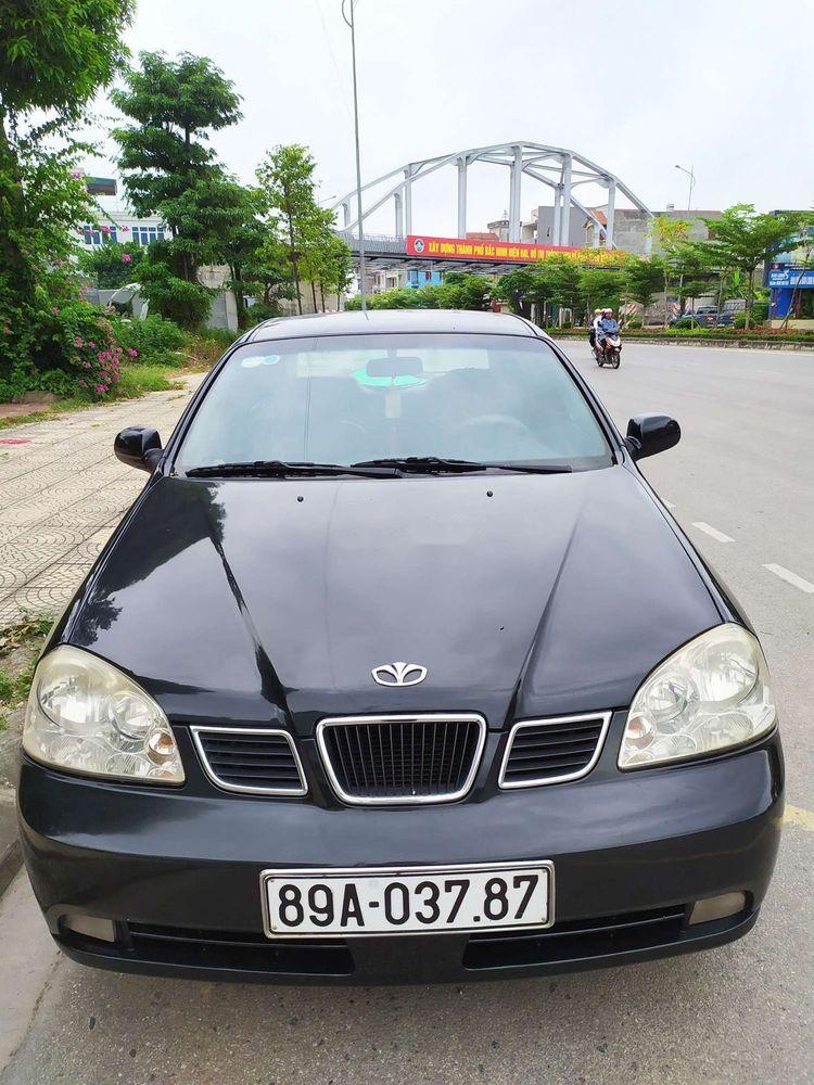 Daewoo Lacetti EX 2005 - Nhà bán Daewoo Lacetti EX đời 2005, màu đen số sàn
