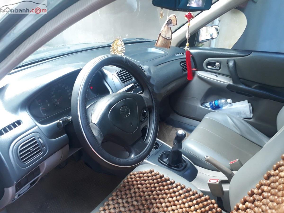 Mazda 323 Standard 2002 - Xe Mazda 323 Standard đời 2002, màu xanh lam, giá 165tr