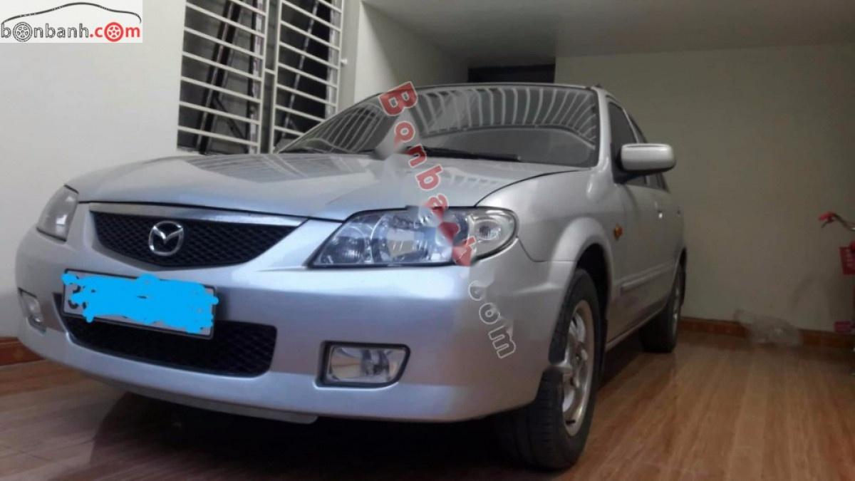Mazda 323 2004 - Chính chủ bán Mazda 323 sản xuất 2004, màu bạc