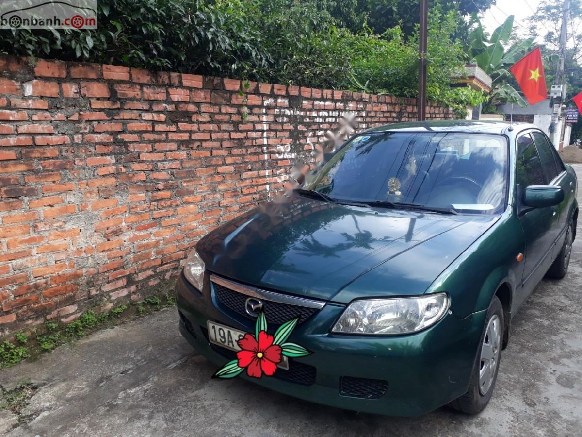 Mazda 323 Standard 2002 - Xe Mazda 323 Standard đời 2002, màu xanh lam, giá 165tr